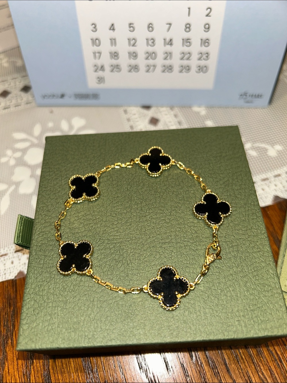 Van Cleef & Arpels Gold Chain Bracelet with Black Clover Motifs